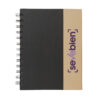 cuaderno espiral con notas adhesivas